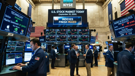 Traders work on the New York Stock Exchange floor beneath market screens showing mixed U.S. stock index performance, with technology-sector gains and elevated energy and geopolitical risks on September 30, 2026.