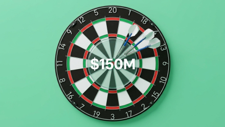 Dartboard with three darts clustered near the bullseye and “$150M” displayed at the center, symbolizing Beta Bionics’ targeted $150 million public offering.