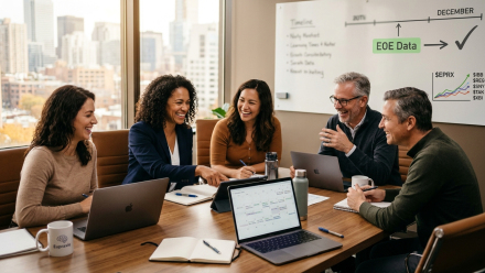 ive professionals meet around a conference table with laptops and calendars, beside a whiteboard highlighting December EoE data and EPRX.